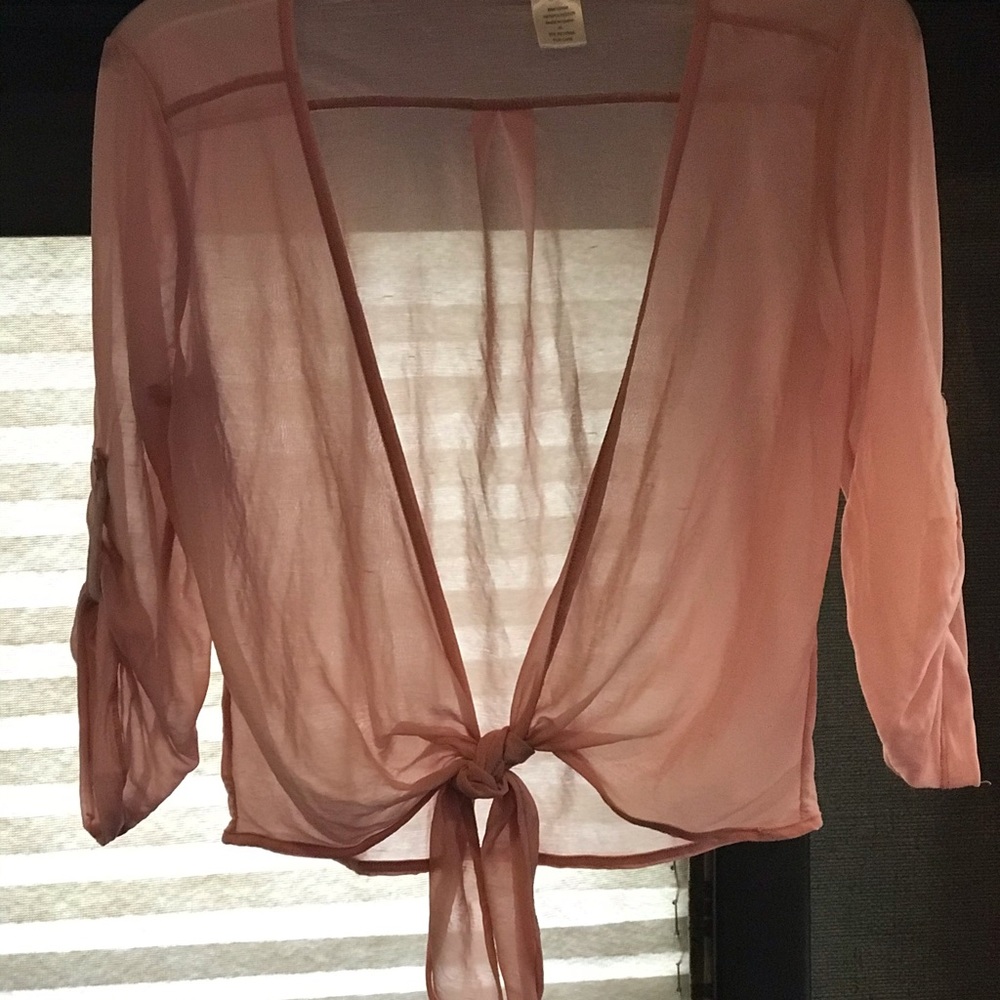 Cover up, see through, the color is a Mauve.